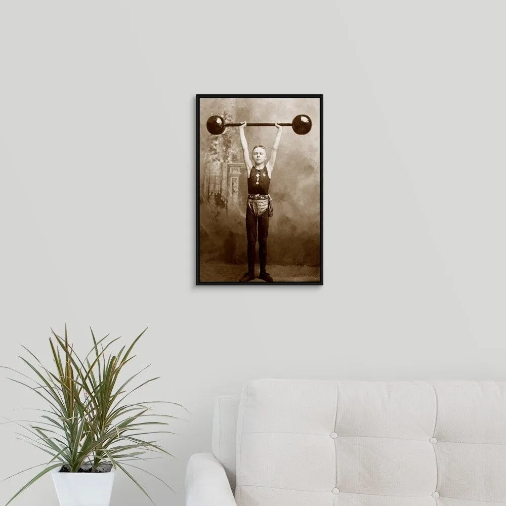 "Boy lifting weights" Black Float Frame Canvas Art