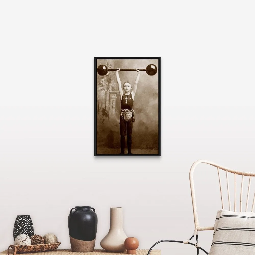 "Boy lifting weights" Black Float Frame Canvas Art