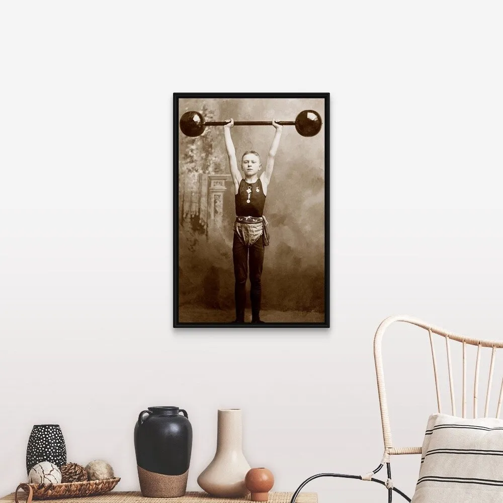 "Boy lifting weights" Black Float Frame Canvas Art